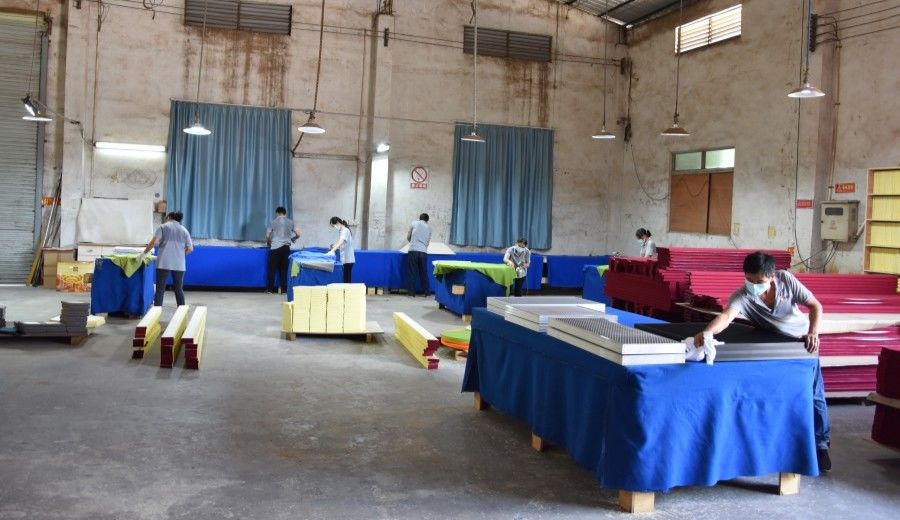 Guangzhou Wuyang Yiguan Acoustic Materials Co., Ltd. línea de producción del fabricante